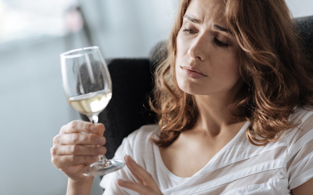 1. A woman reflecting on her drinking habits and looking for real comfort beyond alcohol. 2. Breaking free from alcohol noise and finding true peace and control. 3. Steps to overcome alcohol cravings and achieve emotional balance. 4. Learning how to quiet the thoughts that drive drinking and take back control. 5. A midlife woman embracing a life of clarity and freedom from alcohol.
