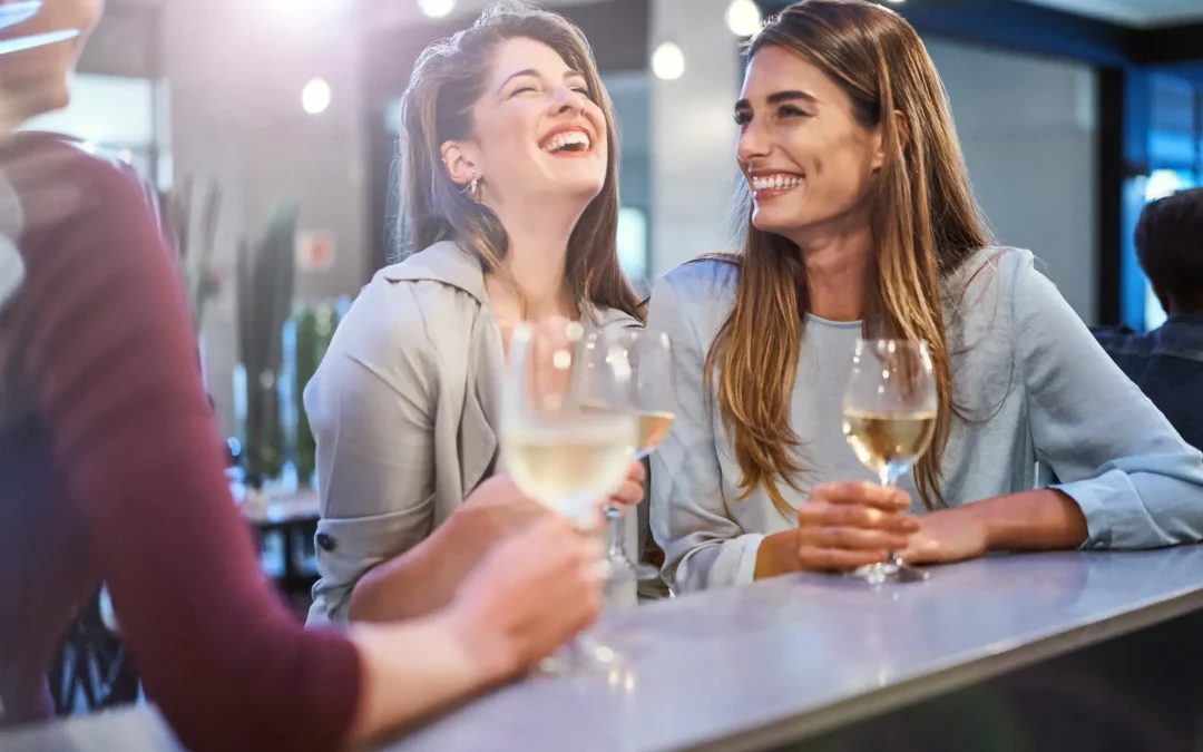 Women enjoying a glass of wine, reflecting on her journey toward self-love and control over her drinking habits
